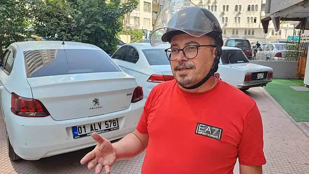 Otomobil kullanırken kask takmadığı için ceza yedi