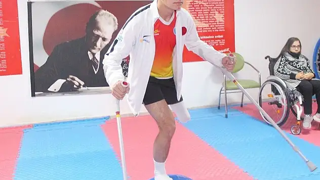 Protezini yeniletmek için gittiği yerde tanıştığı sporda milli takıma seçildi
