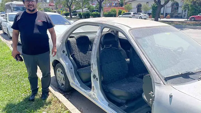 Otomobilinin kapıları çalındı