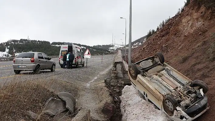 Takla atan araçtan hafif yaralı kurtuldu